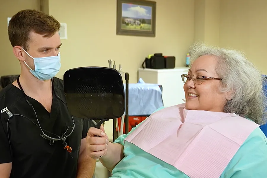 elderly-woman-getting-dental-procedure-done
